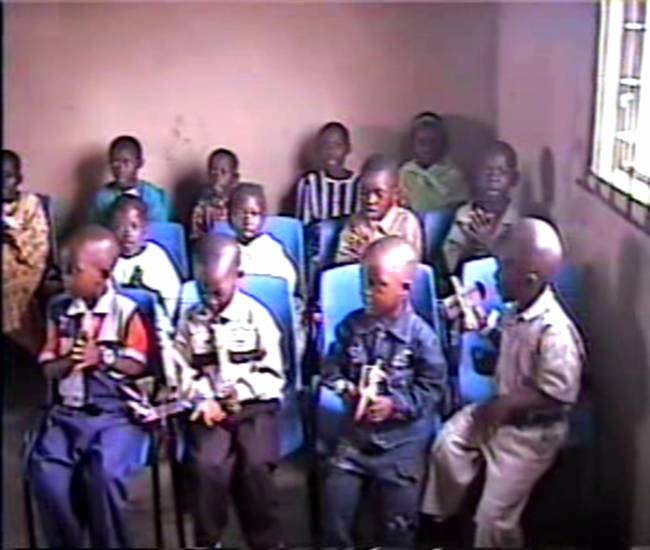 Children being taught their lessons